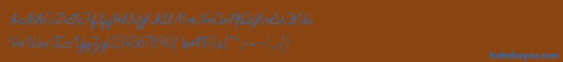 ImransSchoolA Font – Blue Fonts on Brown Background