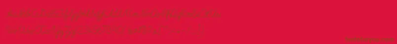 ImransSchoolA-Schriftart – Braune Schriften auf rotem Hintergrund