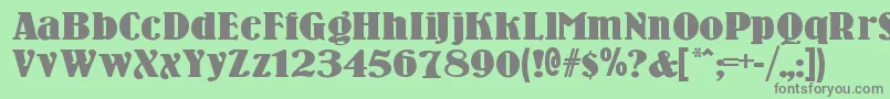 フォントWoodennickelblack – 緑の背景に灰色の文字