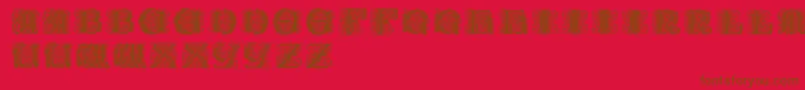 Paulusfranckinitialen-Schriftart – Braune Schriften auf rotem Hintergrund