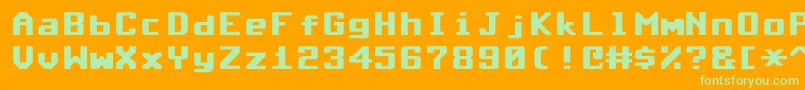 CommodoreRoundedV1.2-fontti – vihreät fontit oranssilla taustalla