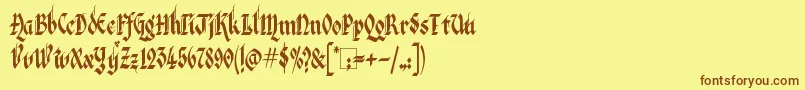 Шрифт KingthingsItalique – коричневые шрифты на жёлтом фоне