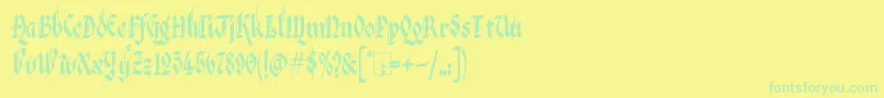 フォントKingthingsItalique – 黄色い背景に緑の文字