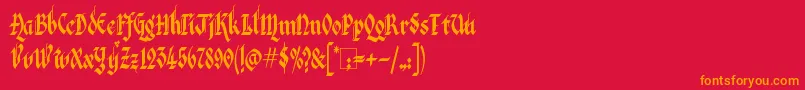 フォントKingthingsItalique – 赤い背景にオレンジの文字