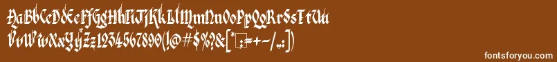 フォントKingthingsItalique – 茶色の背景に白い文字