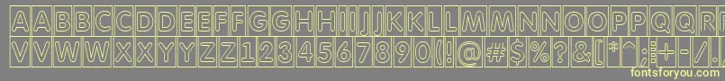 AFuturaroundttlcmotl Font – Yellow Fonts on Gray Background