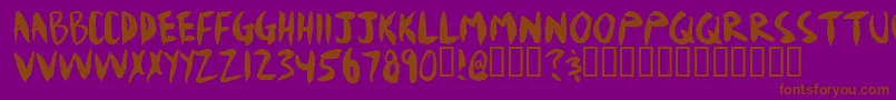 Mudshove Font – Brown Fonts on Purple Background