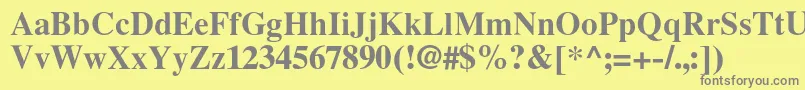 フォントLatinskijcBold – 黄色の背景に灰色の文字