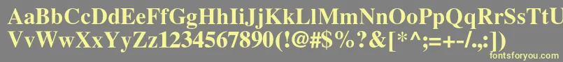 LatinskijcBold Font – Yellow Fonts on Gray Background