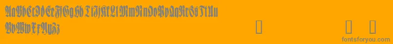 WittenbachDemo-Schriftart – Graue Schriften auf orangefarbenem Hintergrund