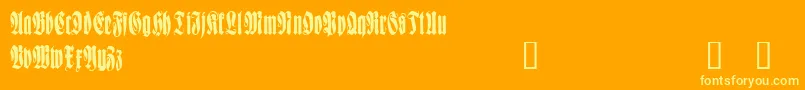 WittenbachDemo-Schriftart – Gelbe Schriften auf orangefarbenem Hintergrund