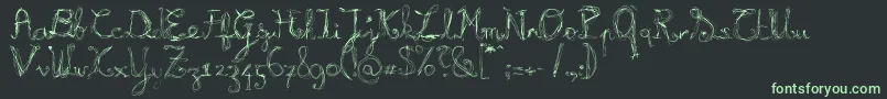 フォントBurnl – 黒い背景に緑の文字