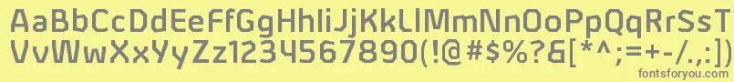 フォントAlphiisbRegular – 黄色の背景に灰色の文字