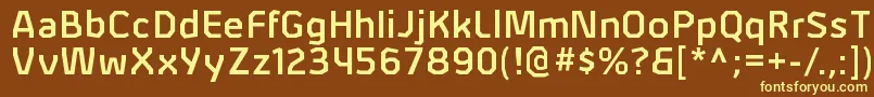 AlphiisbRegular-fontti – keltaiset fontit ruskealla taustalla