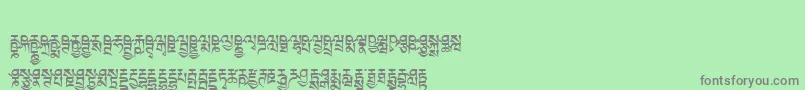 Tibetanmachineweb6 Font – Gray Fonts on Green Background