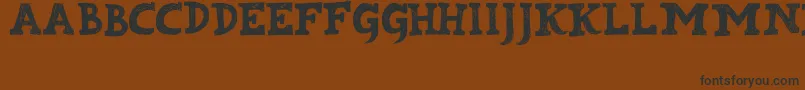 Kabupaten Font – Black Fonts on Brown Background