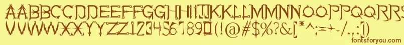 フォントSoulOfHolitter – 茶色の文字が黄色の背景にあります。