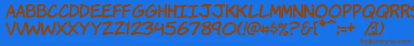 Komikah Font – Brown Fonts on Blue Background