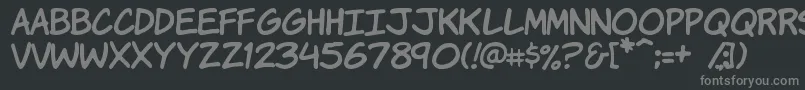 Шрифт Komikah – серые шрифты на чёрном фоне