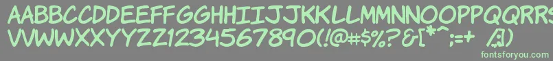 More about Komikah Font Komikah Font – Green Fonts on Gray Background