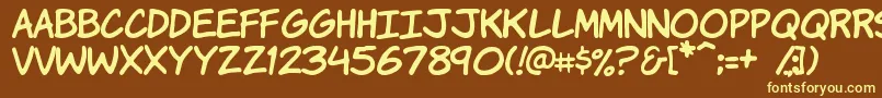 Komikah Font – Yellow Fonts on Brown Background