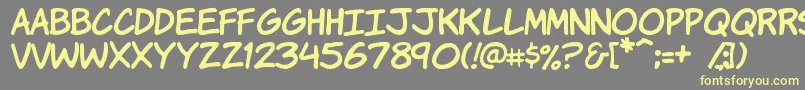Komikah-fontti – keltaiset fontit harmaalla taustalla