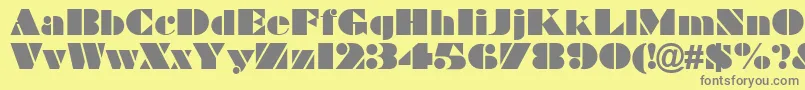 フォントBraggadocio – 黄色の背景に灰色の文字