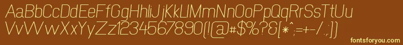 NewmediaKursiv Font – Yellow Fonts on Brown Background