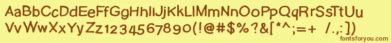 Pudelskerning Font – Brown Fonts on Yellow Background