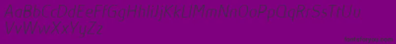 AbsolutProThinItalicReduced Font – Black Fonts on Purple Background