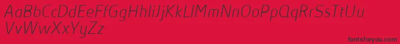 AbsolutProThinItalicReduced Font – Black Fonts on Red Background