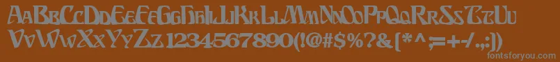 フォントBillionsfontBold – 茶色の背景に灰色の文字