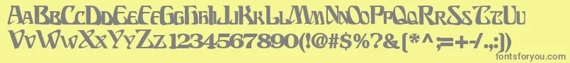 BillionsfontBold-fontti – harmaat kirjasimet keltaisella taustalla