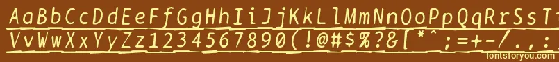 Bptypewritedamagedunderscoreditalics-fontti – keltaiset fontit ruskealla taustalla