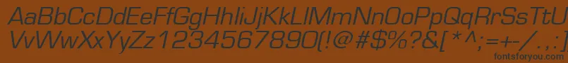 フォントEuromodeItalic – 黒い文字が茶色の背景にあります