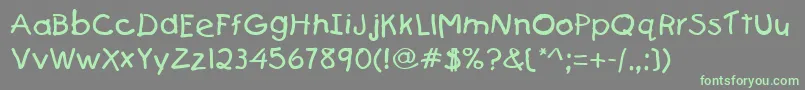 Firstgrader Font – Green Fonts on Gray Background