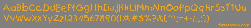 Firstgrader Font – Orange Fonts on Gray Background