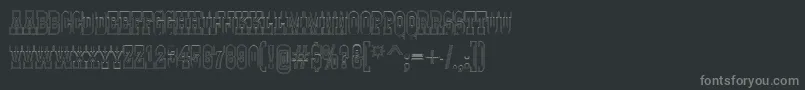 Шрифт GildiatituldblotlRegular – серые шрифты на чёрном фоне