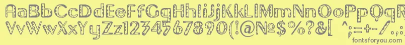 フォントGilgongoTiki – 黄色の背景に灰色の文字