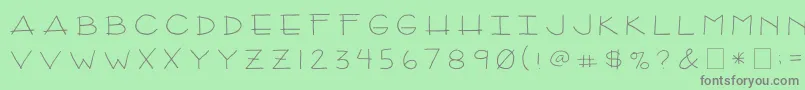 2peasArizona-fontti – harmaat kirjasimet vihreällä taustalla