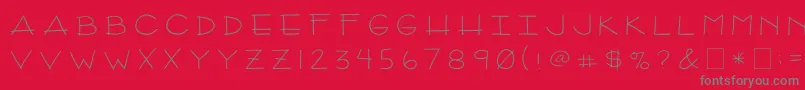 2peasArizona-fontti – harmaat kirjasimet punaisella taustalla