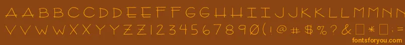 Czcionka 2peasArizona – pomarańczowe czcionki na brązowym tle