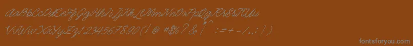 Quickline-Schriftart – Graue Schriften auf braunem Hintergrund