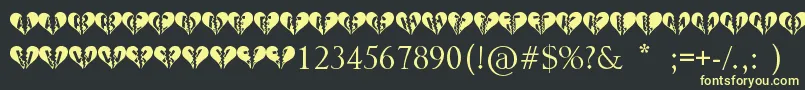 Heartbroken Font – Yellow Fonts on Black Background