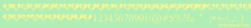 Heartbroken Font – Yellow Fonts on Green Background