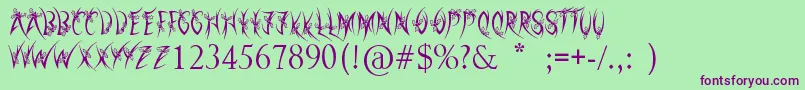 HollyChristmas Font – Purple Fonts on Green Background