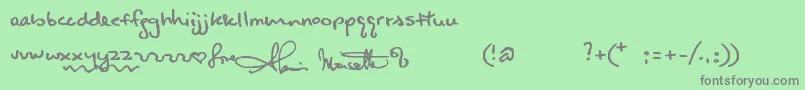 フォントAlanishand – 緑の背景に灰色の文字