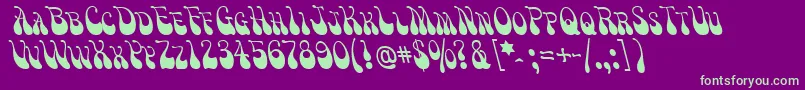 Victm Font – Green Fonts on Purple Background