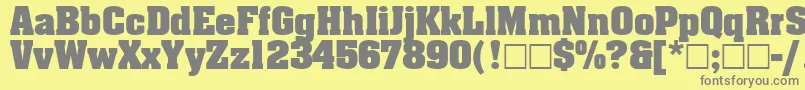 フォントAgaaler – 黄色の背景に灰色の文字