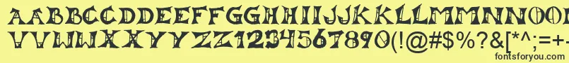 Lestat Font – Black Fonts on Yellow Background